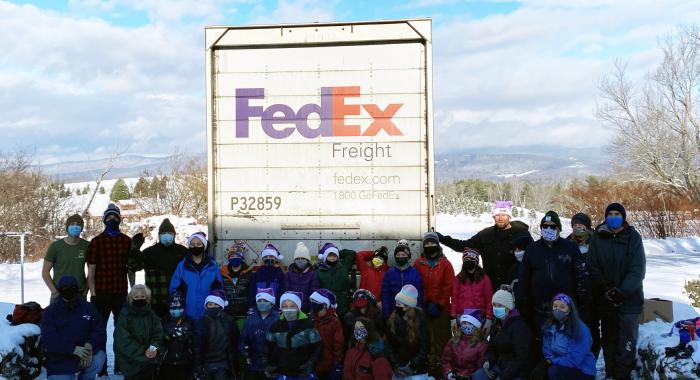 Bethlehem Elementary fifth-graders, volunteers, and FedEx workers pose after the loading was complete.