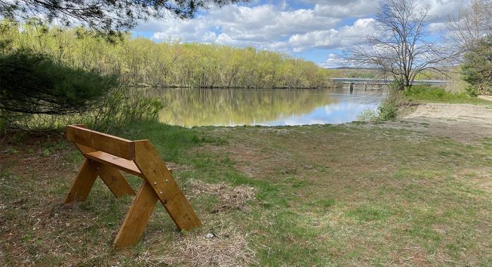 A new bench overlooks the Merrimack River at our Outdoor Education & Conservation Area in Concord.