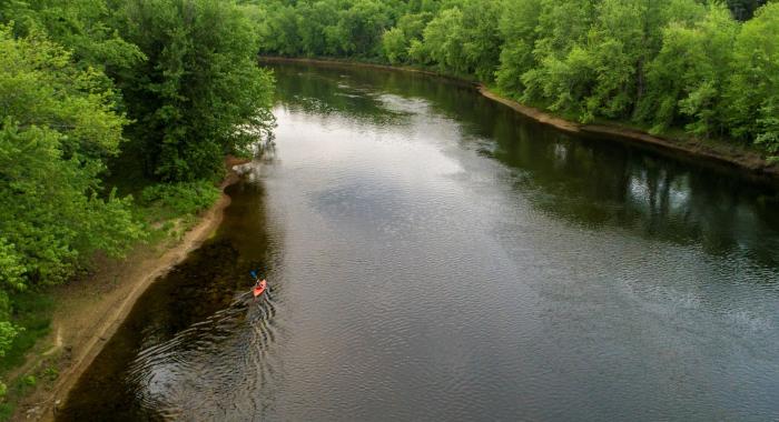 A birds-eye view of the Merrimack River meandering next to Stillhouse Forest.