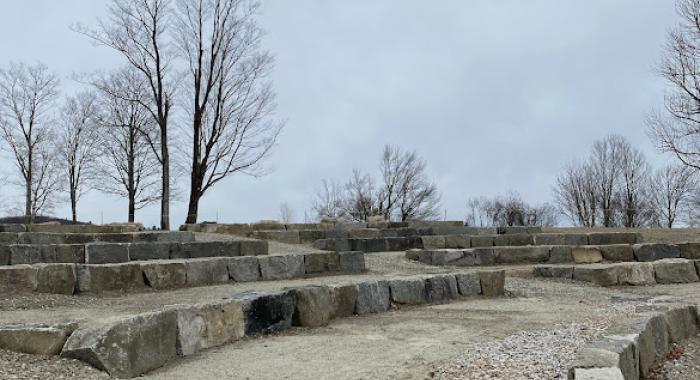 Rocks from the foundation of the former Tool Building were repurposed into an outdoor amphitheater at The Rocks with spectacular views. 