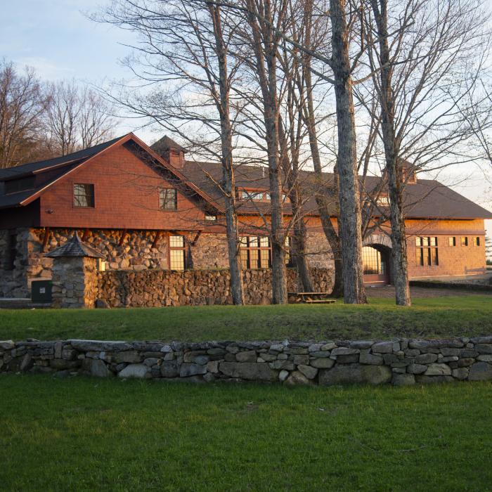 A view of the Carriage Barn at sunrise in spring.