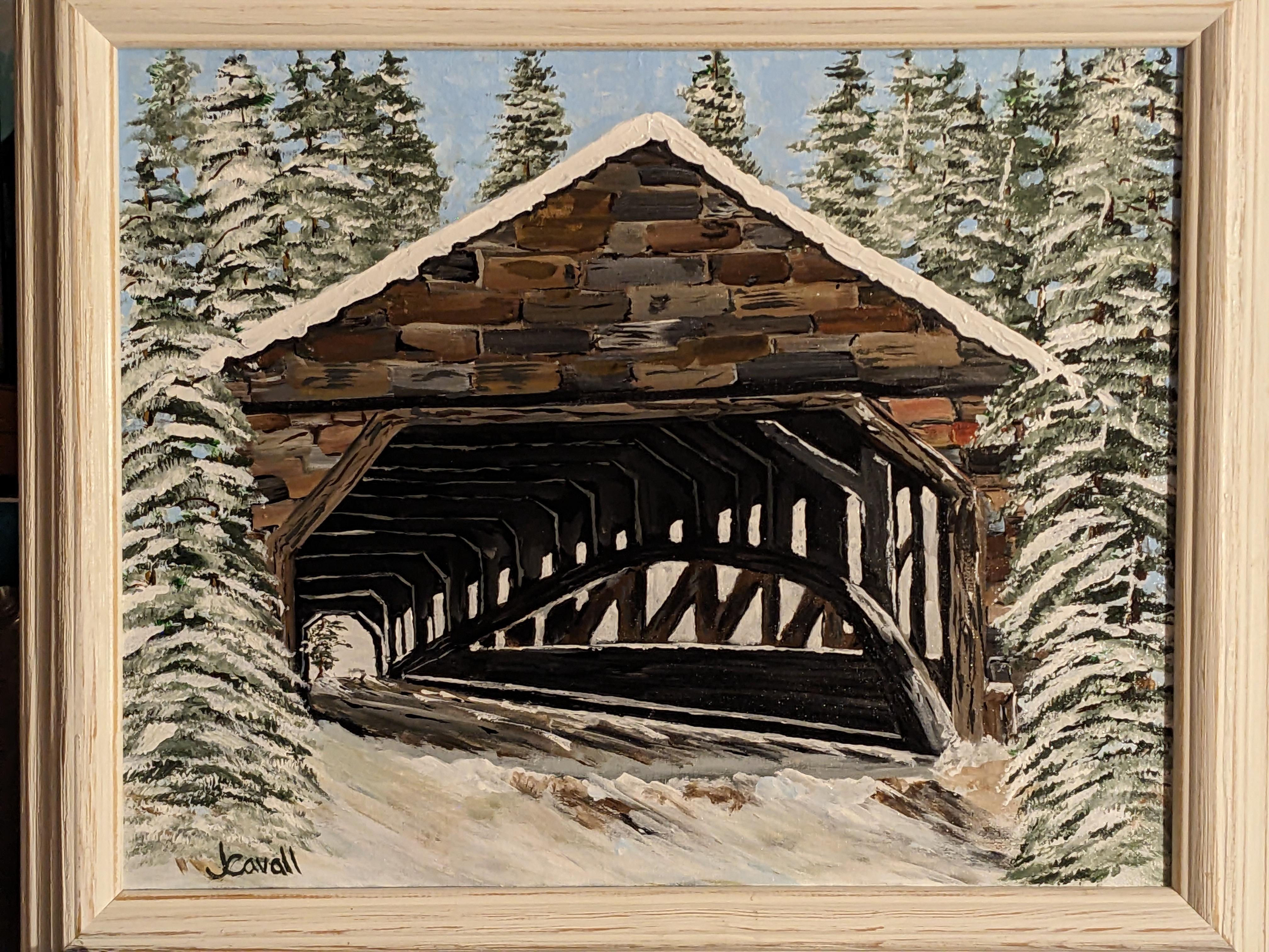 A covered bridge in winter.