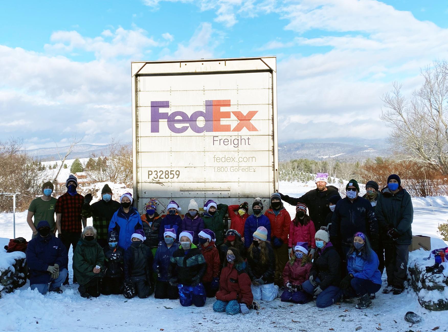 Bethlehem Elementary fifth-graders, volunteers, and FedEx workers pose after the loading was complete.