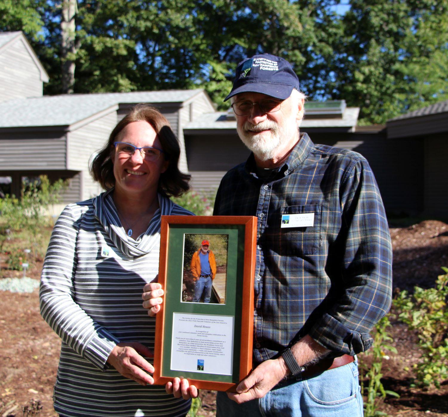 Dave Heuss and Carrie Deegan pose together with Dave's award.