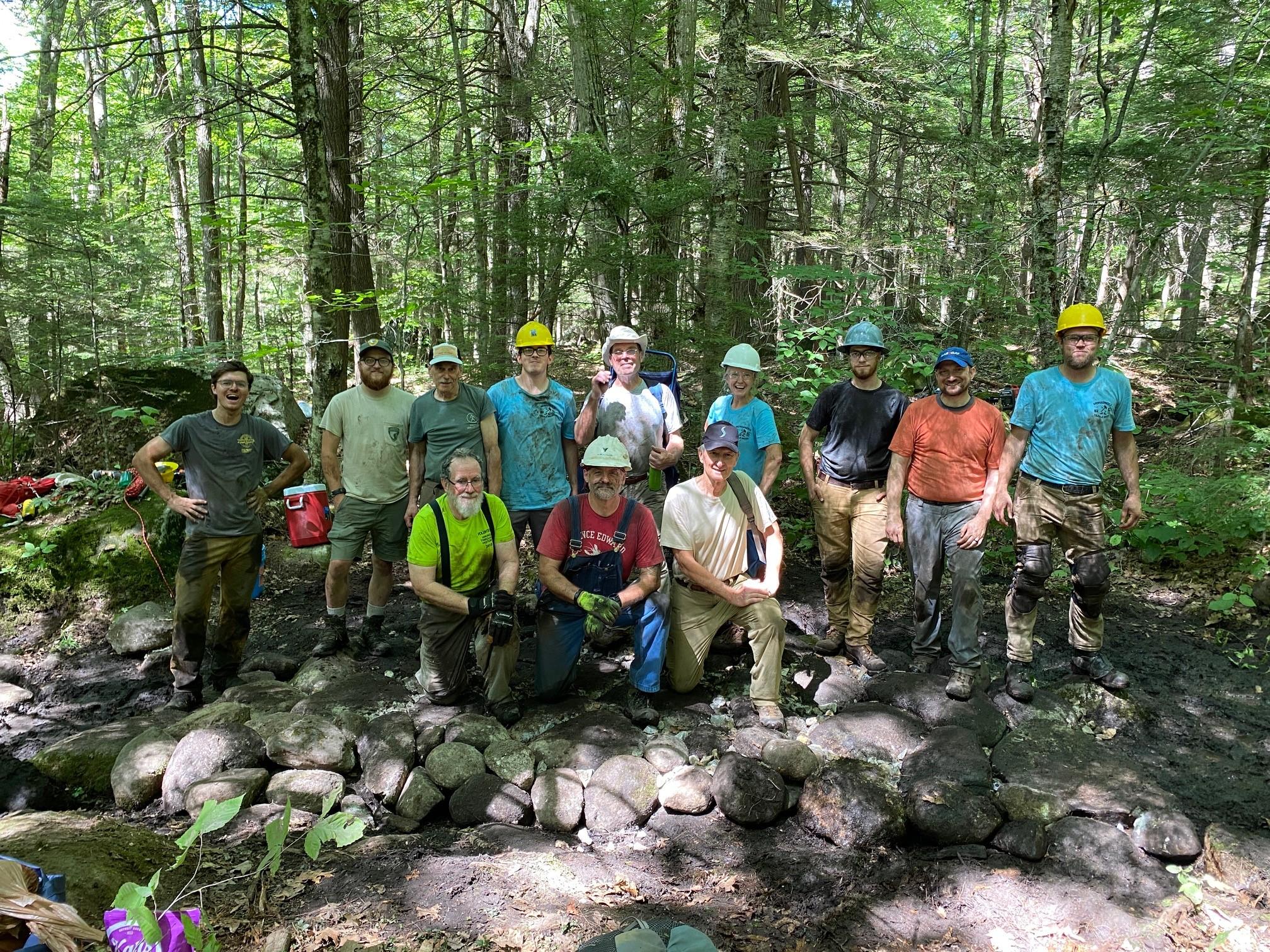 A group of volunteers poses on the Marlboro Trail.
