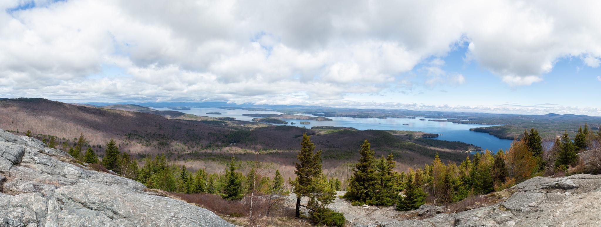 A panorama of Lake Winnipesaukee in the summer as seen from the top of Mount Major.