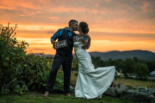 A couple poses during their wedding.