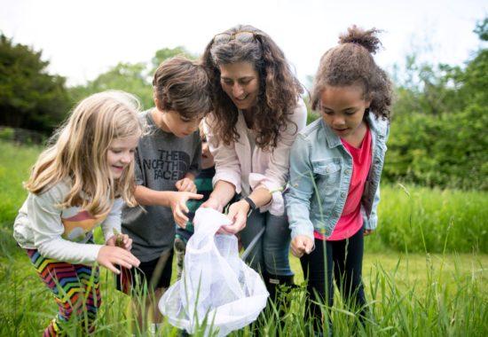 Susie Spikol in nature with little kids.