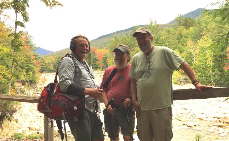 Dave Anderson, Mike Dickerman and Steve Smith pose on a bridge above the Pemigewassett Wilderness Trail at the Lincoln Woods Trailhead.