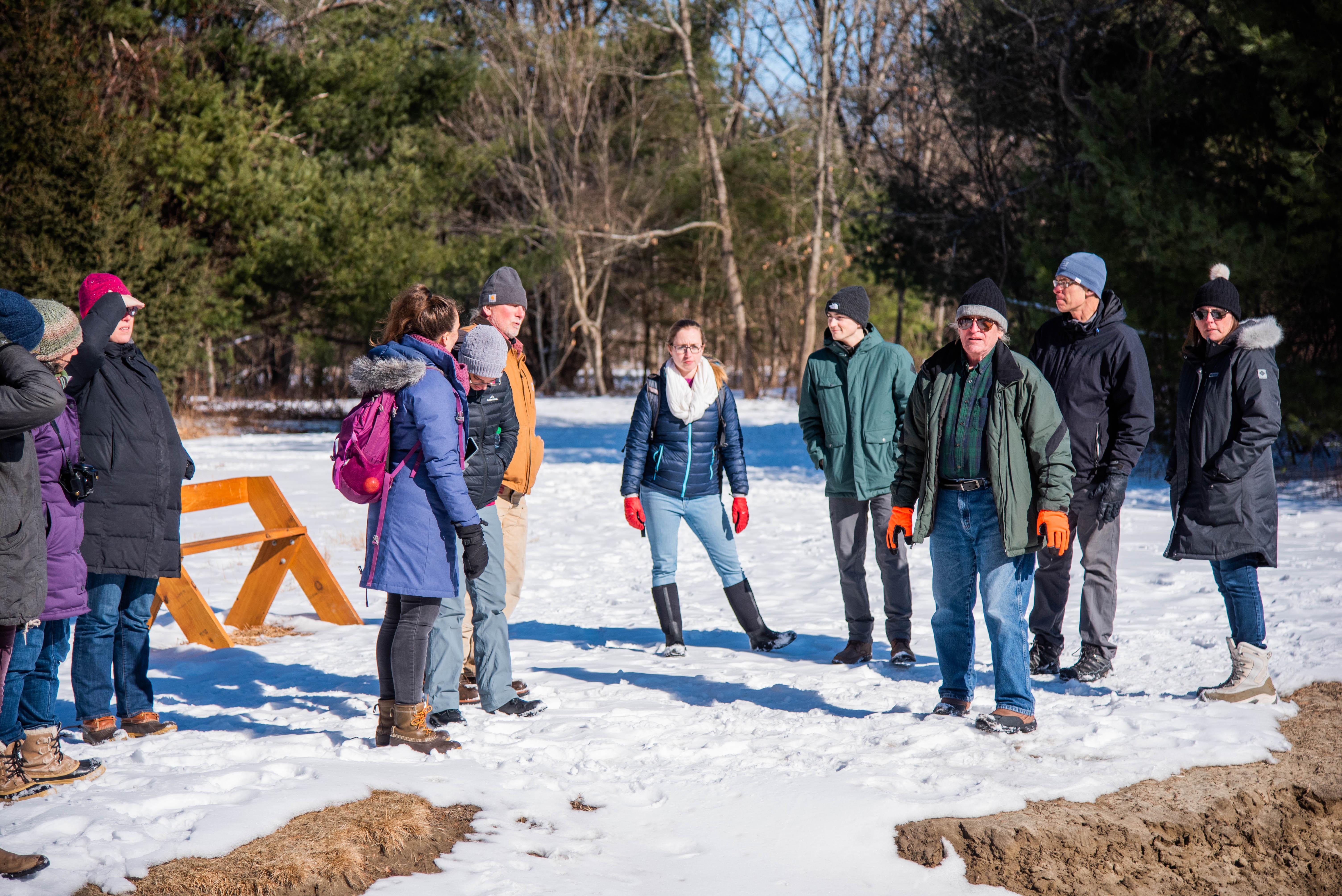 UNH Students on Merrimack riverbank