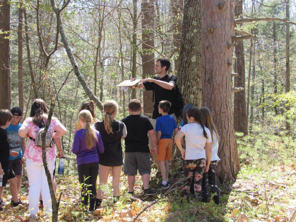 Students listening to forester