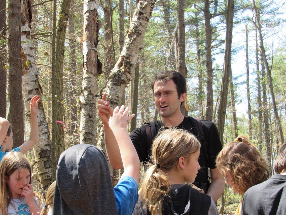 Forester talks with 3rd and 4th grade students