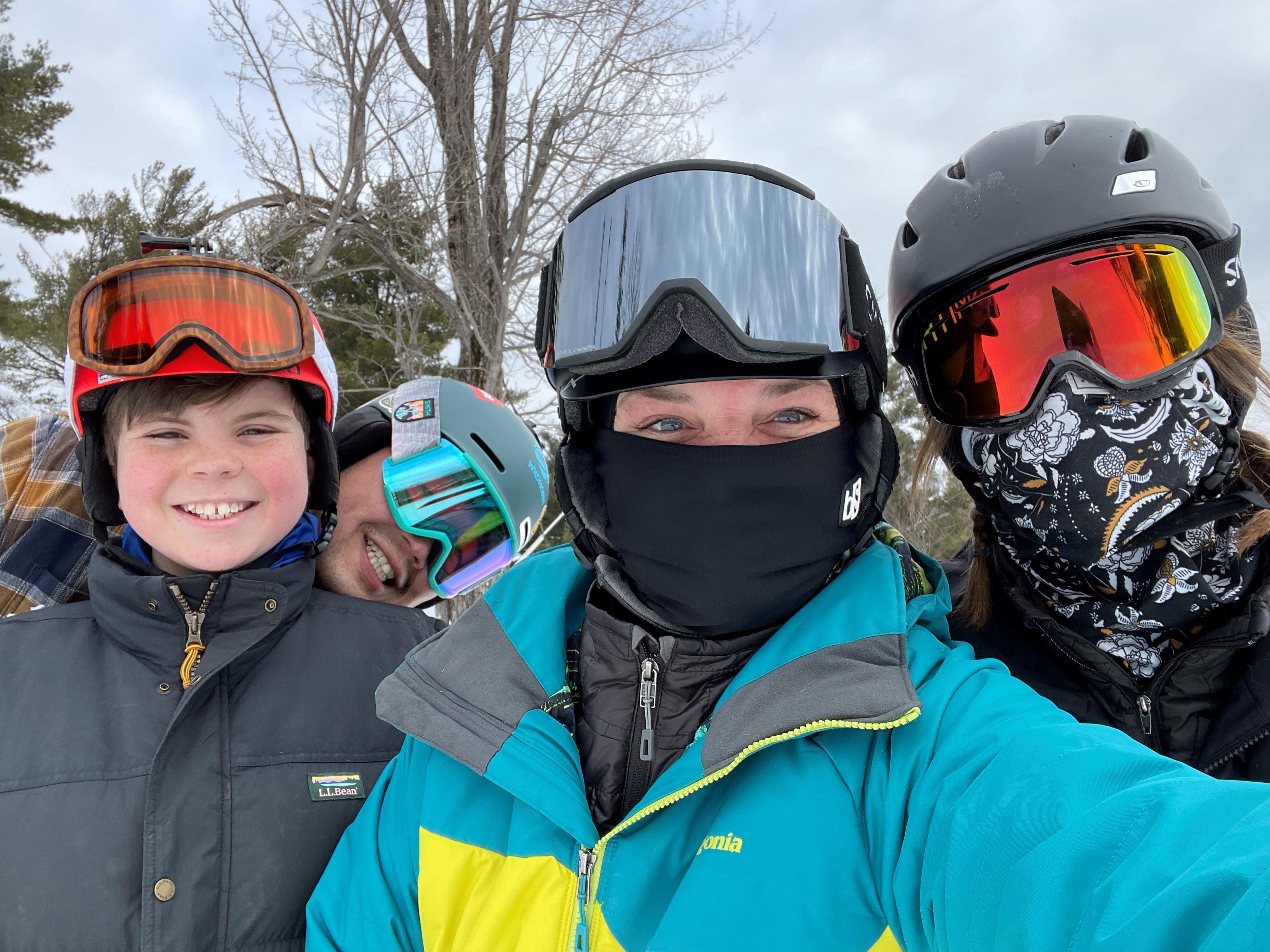 Sarah Kern and her family pose for a photo on the ski hill.