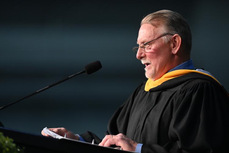 Dave Anderson spoke at the graduate commencement at Plymouth State.