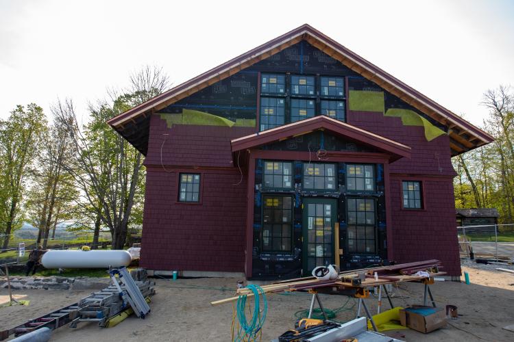 The exterior of the Carriage Barn that faces the parking lot and Fanny's playhouse.