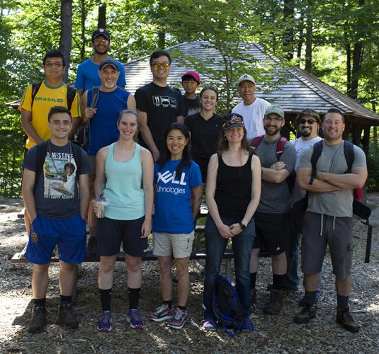 A group of volunteers poses together at Monadnock State Park.