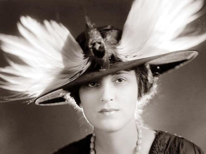 A feathered hat, much the fashion at the turn of the 20th century.