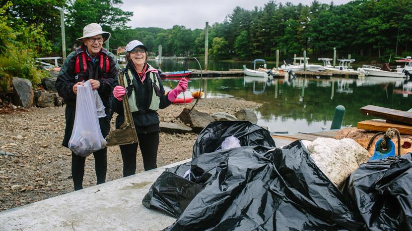 Volunteers collect trash in the estuary in Portsmouth