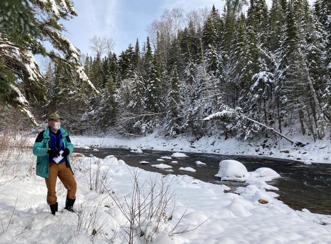 Tom Howe looks over the Ammonoosuc River during a site visit.